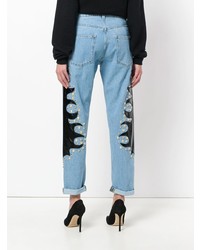 Женские голубые джинсы с шипами от Moschino