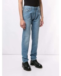 Мужские голубые джинсы от Emporio Armani