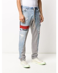 Мужские голубые зауженные джинсы с вышивкой от Greg Lauren