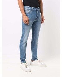 Мужские голубые зауженные джинсы от Calvin Klein Jeans