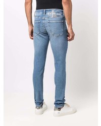 Мужские голубые зауженные джинсы от Calvin Klein Jeans