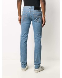Мужские голубые зауженные джинсы от Versace