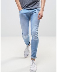 Мужские голубые зауженные джинсы от Wrangler
