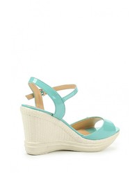 Голубые кожаные босоножки на танкетке от Inario