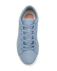 Женские голубые кожаные низкие кеды от Lacoste
