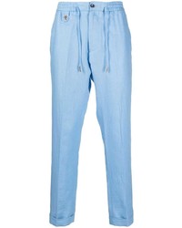Голубые льняные брюки чинос с вышивкой