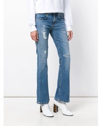 Голубые рваные джинсы-клеш от Dondup