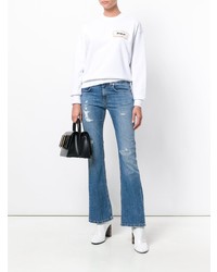 Голубые рваные джинсы-клеш от Dondup