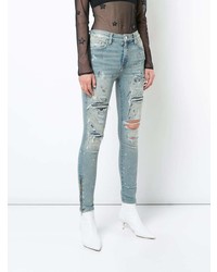 Голубые рваные джинсы скинни от Amiri