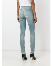 Голубые рваные джинсы скинни от Saint Laurent