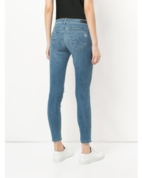 Голубые рваные джинсы скинни от AG Jeans
