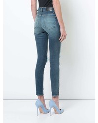 Голубые рваные джинсы скинни от Amiri