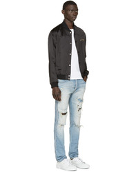 Мужские голубые рваные джинсы от Balmain