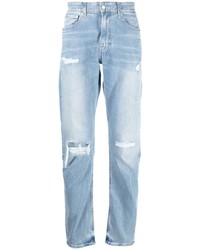 Мужские голубые рваные джинсы от Calvin Klein