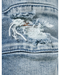 Мужские голубые рваные джинсы от Pierre Balmain