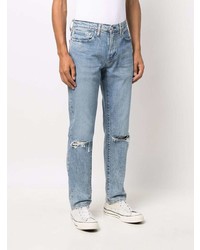 Мужские голубые рваные джинсы от Levi's