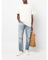 Мужские голубые рваные джинсы от Closed