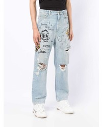 Мужские голубые рваные джинсы от DOMREBEL