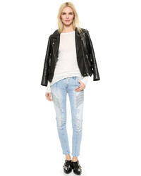 Женские голубые рваные джинсы от Balmain