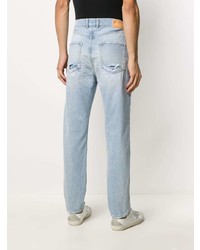 Мужские голубые рваные джинсы от Golden Goose