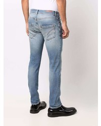 Мужские голубые рваные джинсы от Dondup