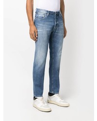 Мужские голубые рваные джинсы от Dondup