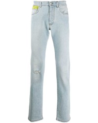 Мужские голубые рваные джинсы от Versace