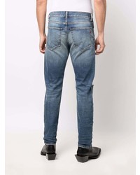 Мужские голубые рваные зауженные джинсы от Diesel