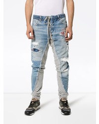 Мужские голубые рваные зауженные джинсы от Greg Lauren