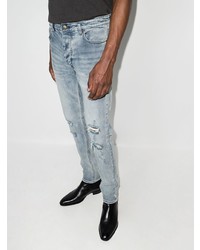 Мужские голубые рваные зауженные джинсы от Ksubi