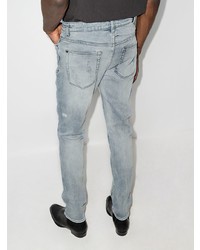 Мужские голубые рваные зауженные джинсы от Ksubi