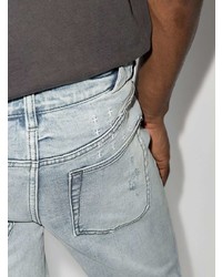 Мужские голубые рваные зауженные джинсы от Ksubi