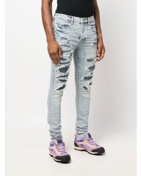 Мужские голубые рваные зауженные джинсы от purple brand