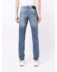 Мужские голубые рваные зауженные джинсы от Armani Exchange