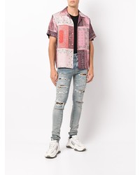 Мужские голубые рваные зауженные джинсы от Amiri