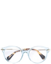 Женские голубые солнцезащитные очки от Miu Miu