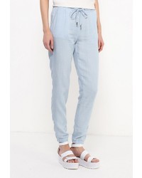 Голубые узкие брюки от Modis