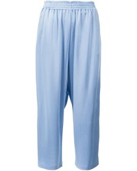 Голубые шелковые брюки