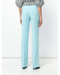 Голубые широкие брюки от Moschino