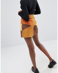 Горчичная замшевая мини-юбка в стиле пэчворк от Monki