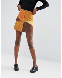 Горчичная замшевая мини-юбка в стиле пэчворк от Monki