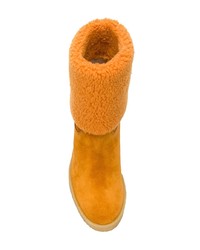 Горчичные замшевые ботильоны на танкетке от Tod's