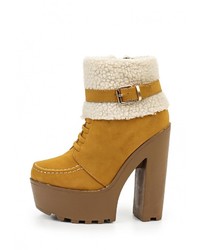 Горчичные замшевые ботильоны от Sergio Todzi