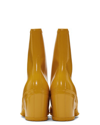 Горчичные кожаные ботильоны от Gucci