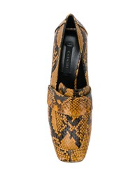 Горчичные кожаные туфли со змеиным рисунком от Casadei