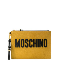 Горчичный кожаный клатч от Moschino