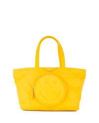Желтая большая сумка из плотной ткани от Anya Hindmarch