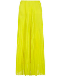 Желтая длинная юбка со складками
