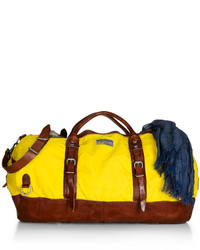 Желтая дорожная сумка из плотной ткани