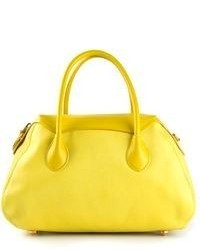 Желтая кожаная большая сумка от Nina Ricci